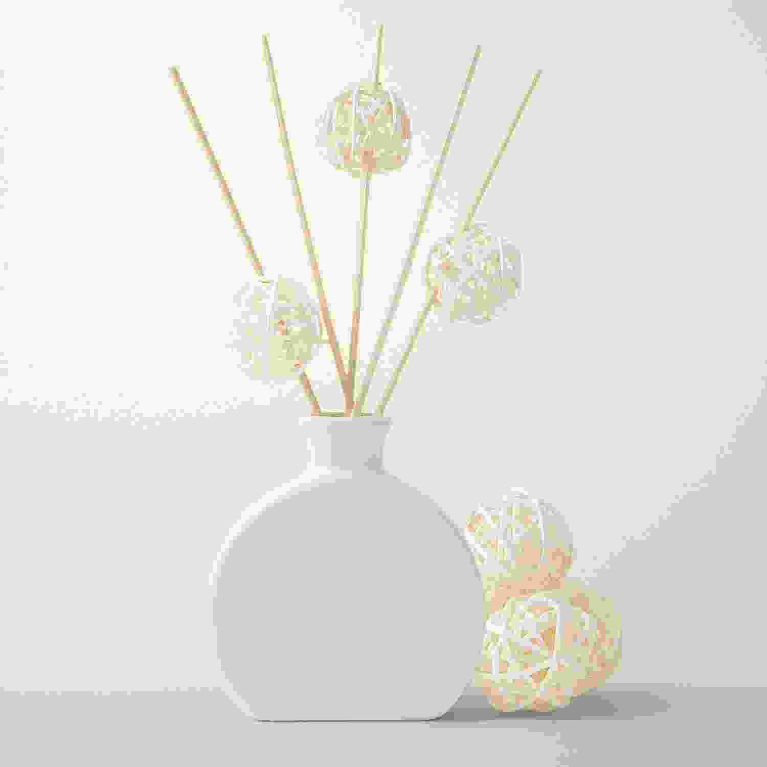 white vase with bamboo ball white vase with bamboo ball